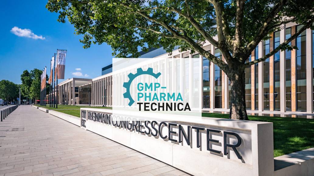 GMP PharmaCongress, Menschen bei einer Konferenzpr&auml;sentation.